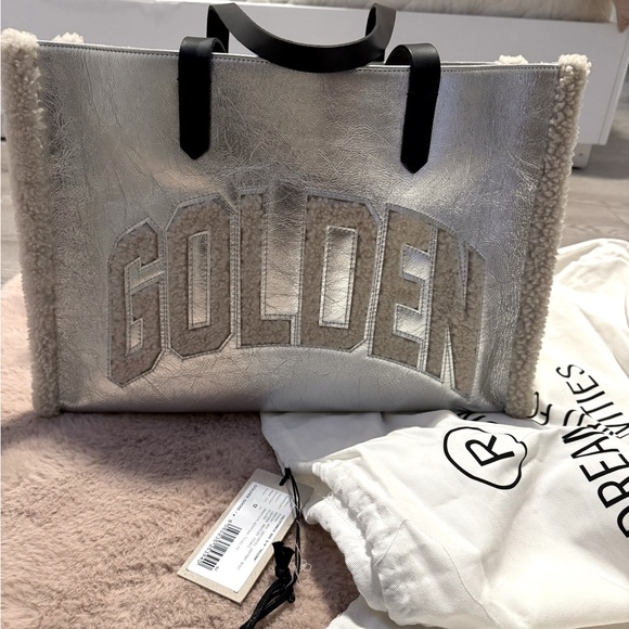 Golden Goose Silver Tote Bag for Sale
Elevate your style with this stunning bag - Picture 1 of 4